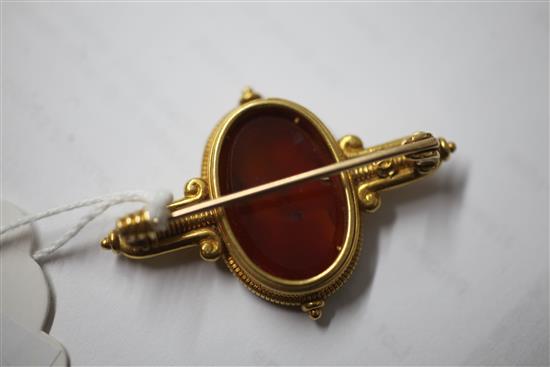 A Victorian Castellani gold and Roman carnelian intaglio archaeological revival style brooch, 49mm.